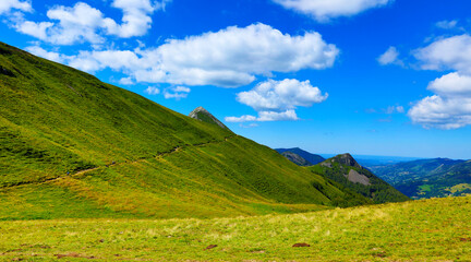 Fototapeta premium beautiful Cantal landscape in France- hiking trail in mountain-Puy Mary, Puy Griou