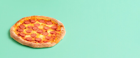 Pepperoni pizza with mozzarella. Homemade rustic pizza with copy space