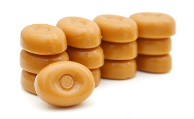 caramel candies over white
