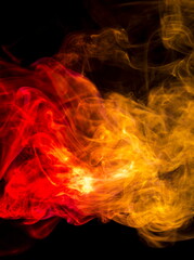 Fototapeta premium Colored smoke on black background