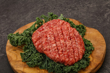 Raw beef burger cutlet for cooking