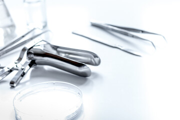 instruments of gynecologist on white background