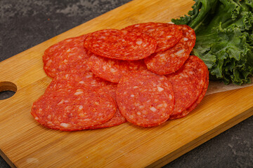 Italian spycy pepperoni sausage slices