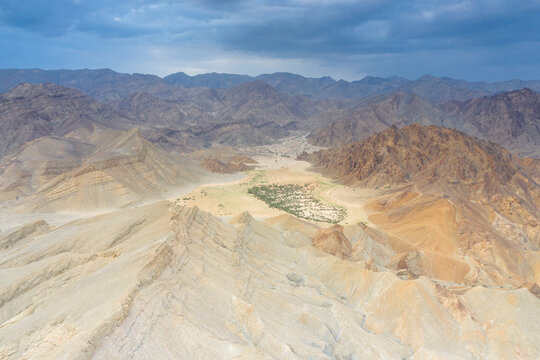 Aerial view of Oasis amidst rocks of Wadi Saba canyon, Melabday, Asso Bhole, Dallol, Danakil Depression, Afar, Ethiopia