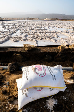 Salt bags and salt mine, Lake Afrera (Lake Afdera), Danakil Depression, Afar Region, Ethiopia