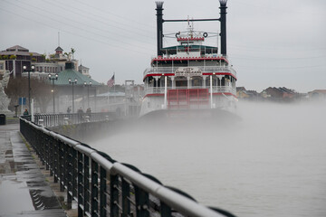 Paddlewheel boat in the fog on the Mississippi River