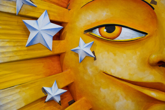 Detail of a giant sunshine made of styrofoam that will appear on a Mardis Gras float