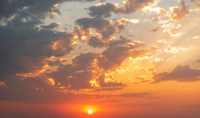 Beautiful colorful sunset sky with orange clouds. Nature sky background.
