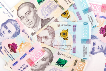 Ukrainian money is one thousand, five hundred and two hundred hryvnias. National currency. Corruption in Ukraine. Enterprise capital investment, finance, savings, bank and people concept. Close-up
