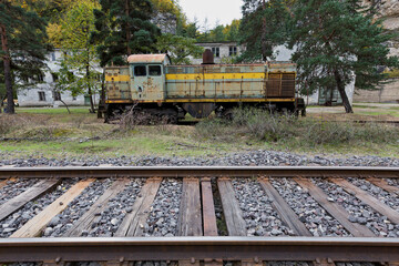 Abandoned Russian railroad tracks and locomotive from Soviet era, in Georgia, Caucasus