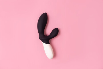 on a pink background sex product, toy for adults