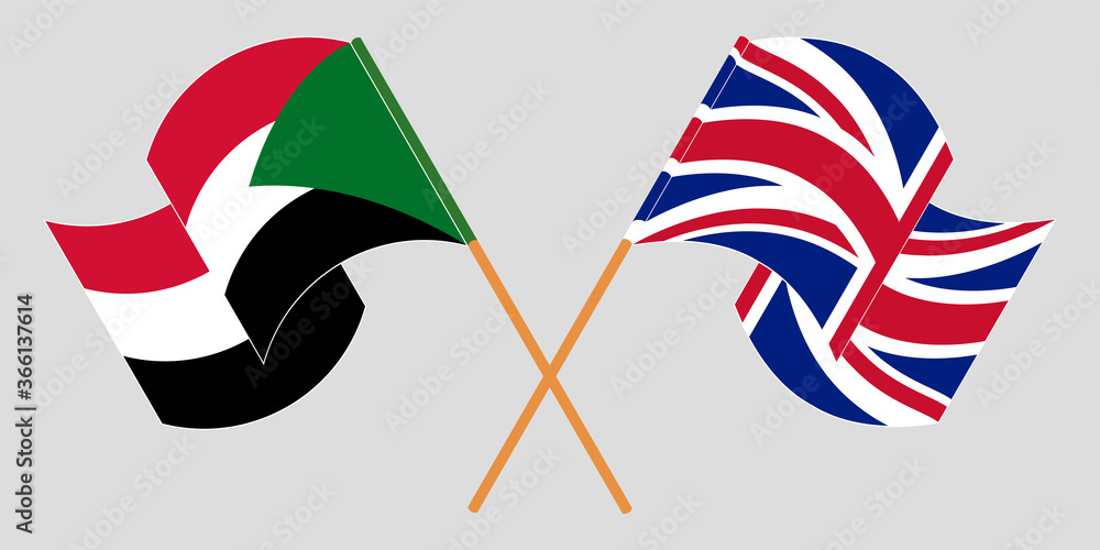 Wall mural crossed and waving flags of sudan and the uk