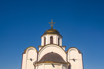 cross on a background of blue sky. Concept of faith