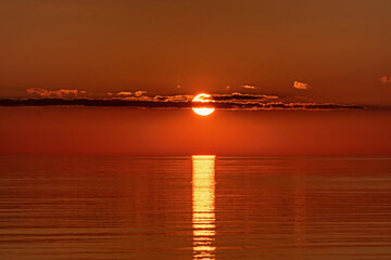 Naklejka premium Sunset on the lake. Pskov region. Russia