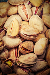 Pistachios macro image. Vertical image of fryed nuts organic food
