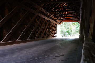 Inside view of the wood trusses in the historic wooden covered Cabin Run bridge in Plumstead, Bucks County, Pennsylvania, United States.