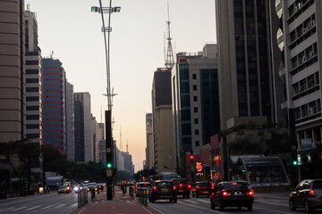 Fototapeta na wymiar famous Paulista avenue in Sao Paulo city, at sunset. buildings and traffic in the financial center
