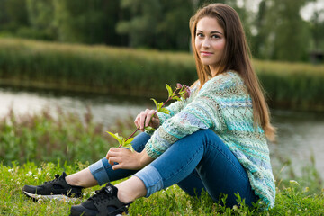 Romantic girl on an evening summer walk
