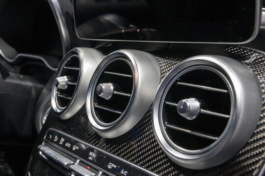 GENEVA, SWITZERLAND - MARCH 6, 2018: Dashboard console view of a Mercedes AMG C43 car showcased at the 88th Geneva International Motor Show.