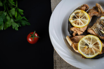 fried fish with herbs and lemon