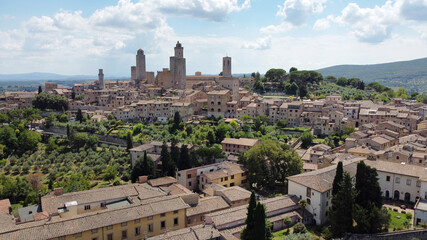 Fototapeta na wymiar San Gimignano, Tuscany, Italy - July 16, 2020: aerial view of the medieval city of San Gimignano