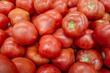 fresh juicy tomatoes at the market