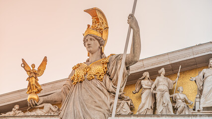 Athena statue at fountain (Pallas-Athene-Brunnen) in front of the Parliament, an ancient Greek...