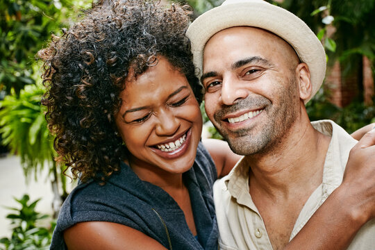 Couple smiling together outdoors - Powered by Adobe