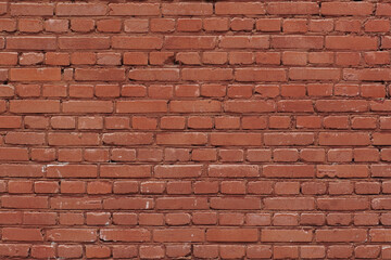 Full frame image of the old painted red brick wall. Close-up view of the brickwork for texture or background, copy space