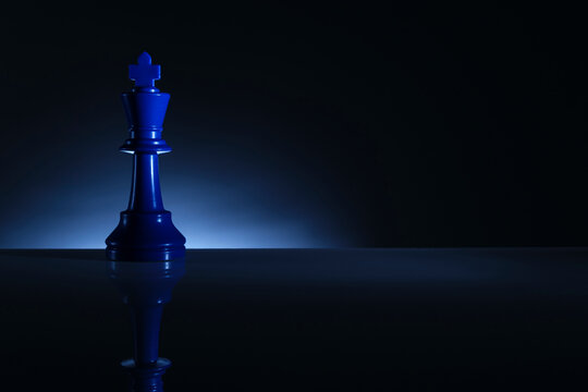 Studio shot of blue chess king