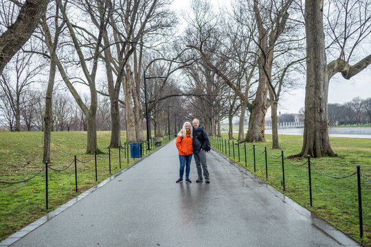USA, Washington D.C., Senior couple posing for photo in park