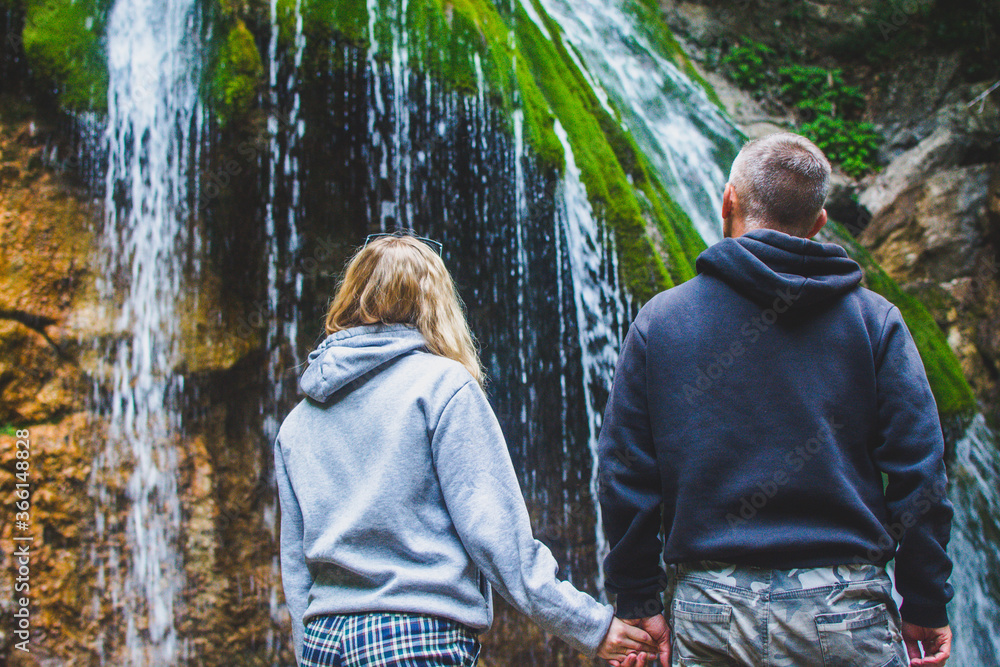 Poster People at the waterfall