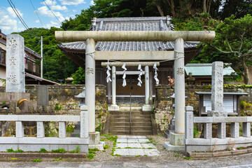 Torii gate of the shintoist Kanaya Shrine dedicated to the god of metal Kanayama Hikonokami at the foot of the stone quarry of Mount Nokogiri or sawtoothed mountain.