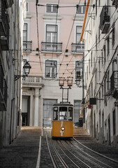 Fototapeta na wymiar Famous Bica Funicular (Elevador da Bica or Ascensor da Bica), the third oldest of all, inaugurated in 1892, in district of Baixa-Chiado, Lisbon, Portugal.