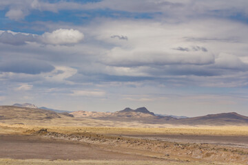 pampa with mountains in the background and clear sky