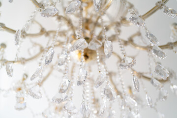 chandelier with sparkling crystal, background in bright colors