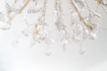 chandelier with sparkling crystal, background in bright colors