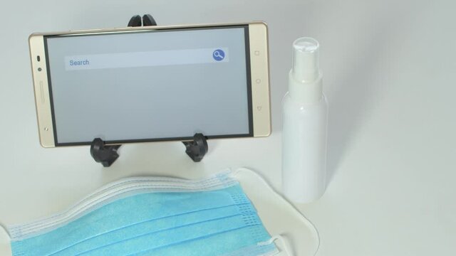 Online shopping in times of covid-19 pandemic, purchase of protective masks and alcohol gel. Online pharmacy.