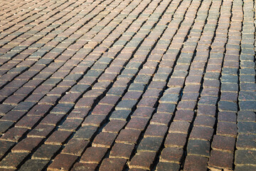 abstract background of cobble stone road making from cement blocks