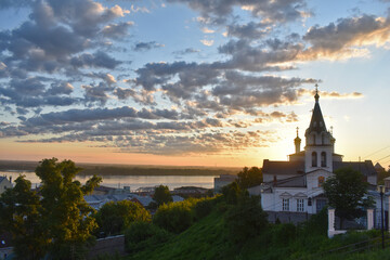 Christian church on the banks of the Volga River at dawn. Nizhny Novgorod