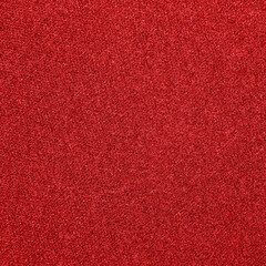 The texture of the red carpet dense.Red fabric background.