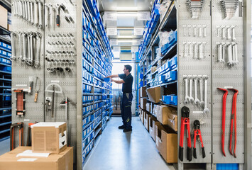 Man in storage room of a factory