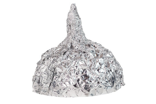 Aluminium foil hat isolated on white background, symbol for conspiracy theory and mind control protection.