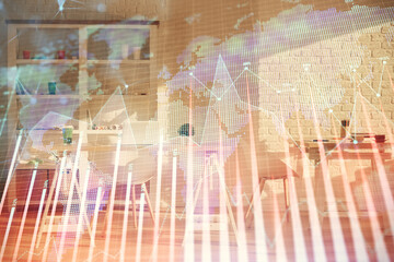 Double exposure of financial graph drawing and office interior background. Concept of stock market.
