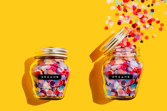 Cosed and open jar of colorful confetti