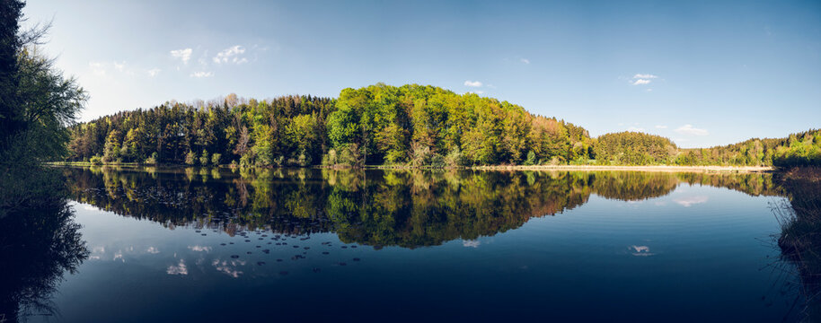 Germany, Bavaria, Egling, Panorama ofÔøΩThanninger Weiher lake in spring