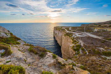 Fototapeta na wymiar Sunset over the Maltese Coastline
