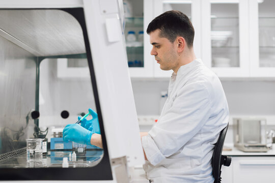 Male healthcare worker doing research in pharmaceutical laboratory