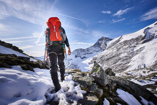 Rear view of female mountaineer, Glacier Grossvendediger, Tyrol, Austria