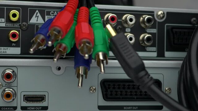 Audio Video Component RCA Connectors On The Back Side Of DVD Player And Component Video Cables Slider Shot.